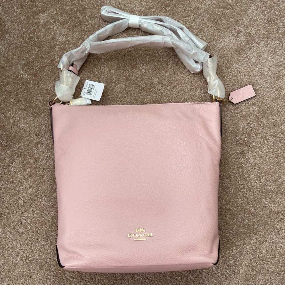 Coach blossom and gold shoulder or crossbody purse. Brand new.